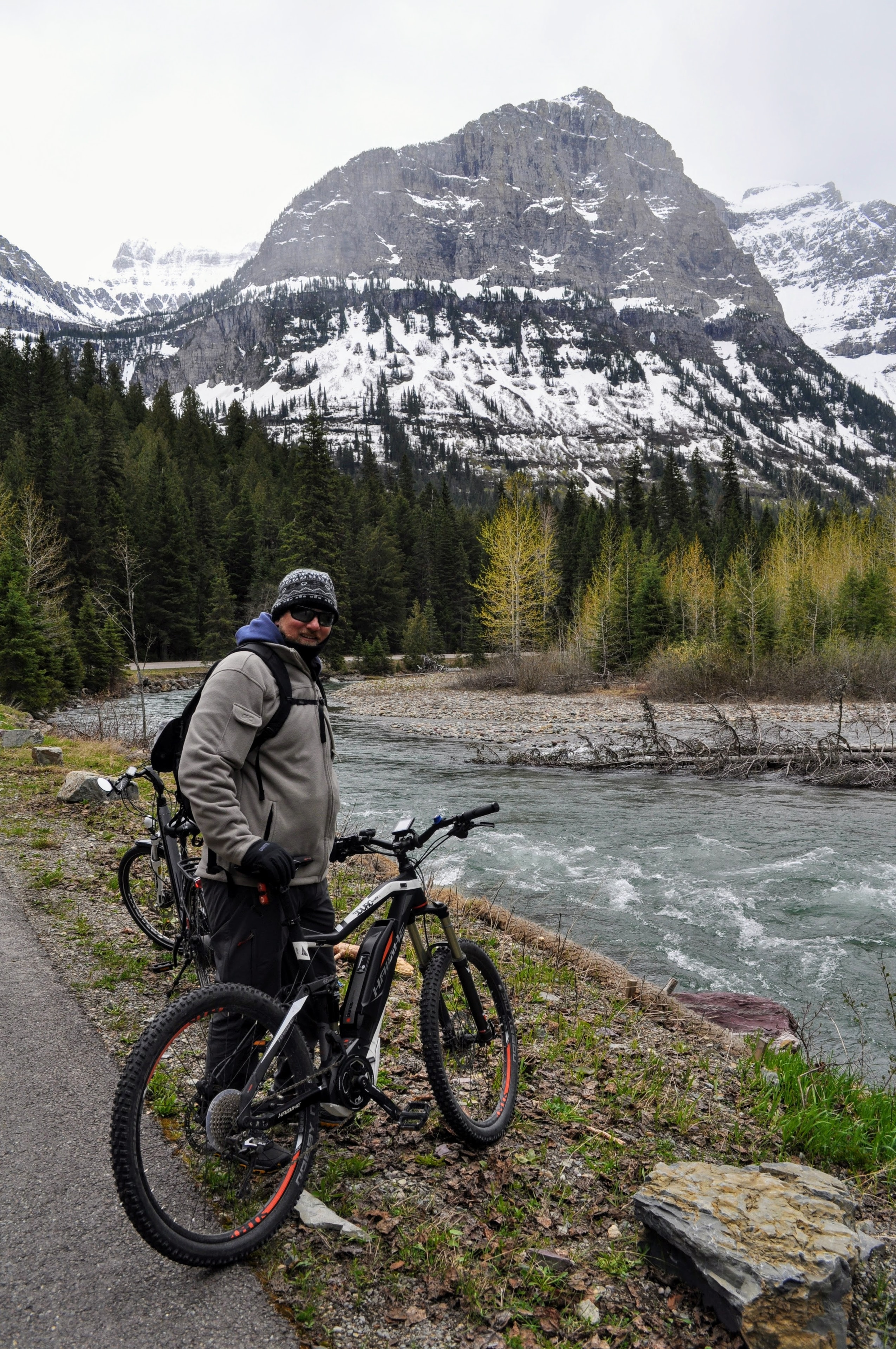 Captain Stingray with a mountain bike by a river
